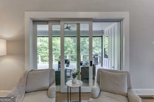 4781 Falling Brook Dr, Flowery Branch, GA 30542 - living room with plenty of natural light, ceiling fan, and baseboards