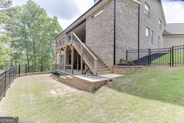 4781 Falling Brook Dr, Flowery Branch, GA 30542 - back of house with brick siding, stairs, ceiling fan, and a deck