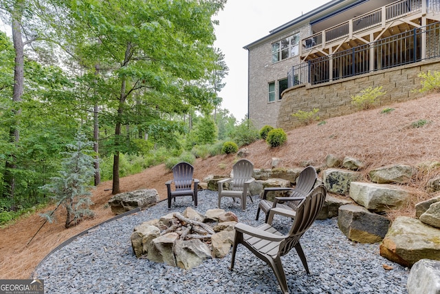 4781 Falling Brook Dr, Flowery Branch, GA 30542 - view of patio featuring an outdoor fire pit