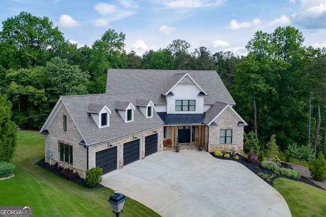 4781 Falling Brook Dr, Flowery Branch, GA 30542 - view of front of home with stone siding, concrete driveway, a front yard, roof with shingles, and a garage