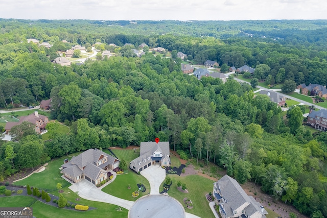4781 Falling Brook Dr, Flowery Branch, GA 30542 - aerial view of property and surrounding area with a heavily wooded area and nearby suburban area