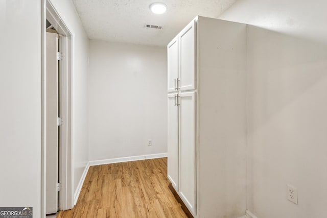 232 Apple Branch Dr, Woodstock, GA 30188 - corridor with light wood-type flooring and baseboards