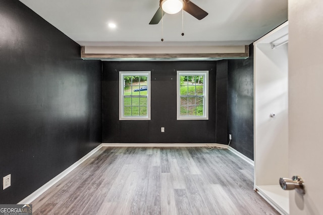 232 Apple Branch Dr, Woodstock, GA 30188 - spare room featuring wood finished floors, baseboards, and a ceiling fan