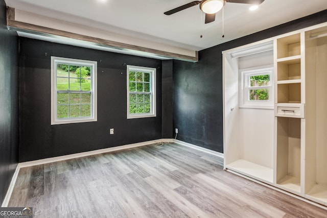 232 Apple Branch Dr, Woodstock, GA 30188 - unfurnished bedroom featuring wood finished floors, multiple windows, and baseboards