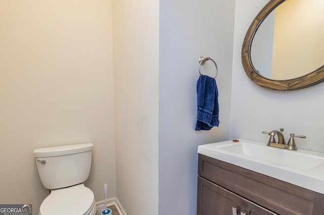 111 Portico Pl, Newnan, GA 30265 - half bathroom featuring toilet, vanity, and baseboards