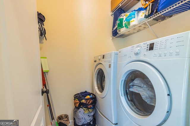 111 Portico Pl, Newnan, GA 30265 - laundry area with washer and clothes dryer