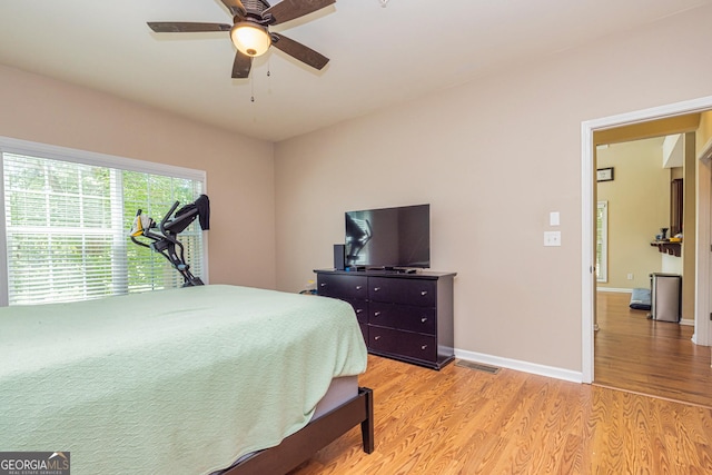 111 Portico Pl, Newnan, GA 30265 - bedroom featuring light wood finished floors, baseboards, and ceiling fan
