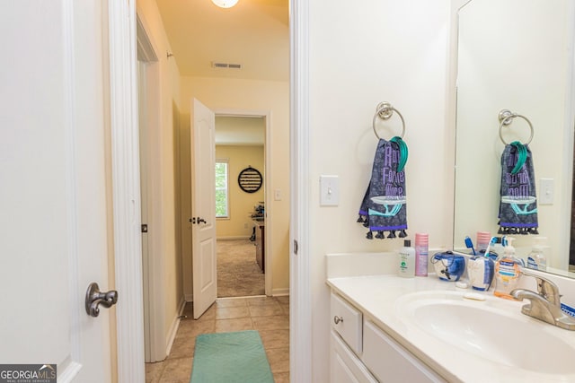 111 Portico Pl, Newnan, GA 30265 - bathroom with vanity, tile patterned floors, and baseboards