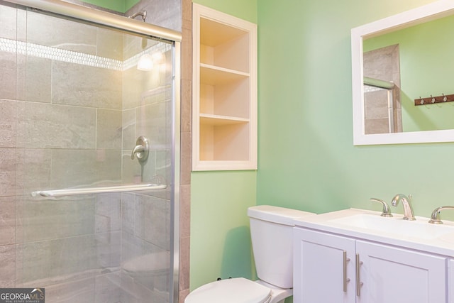 111 Portico Pl, Newnan, GA 30265 - bathroom featuring toilet, a shower stall, and vanity
