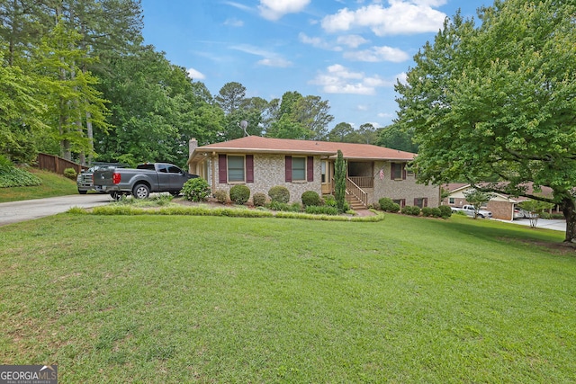 2149 New London Pl, Snellville, GA 30078 - ranch-style home with a chimney and brick siding