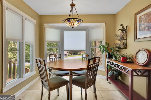 2149 New London Pl, Snellville, GA 30078 - dining room with plenty of natural light and light tile patterned flooring