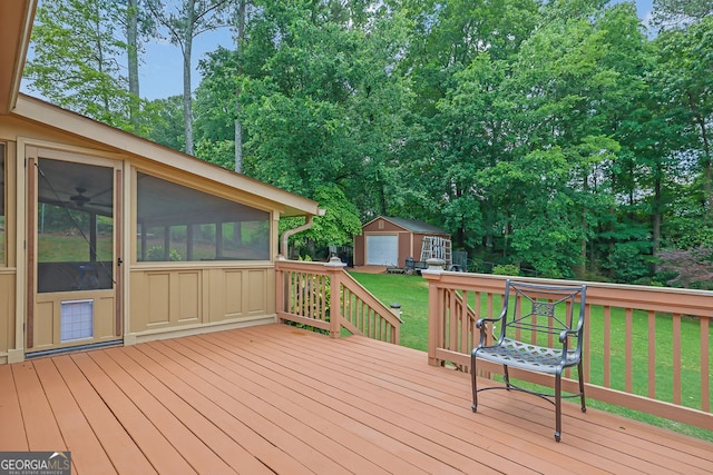 2149 New London Pl, Snellville, GA 30078 - wooden terrace with an outdoor structure, view of scattered trees, a sunroom, and a lawn
