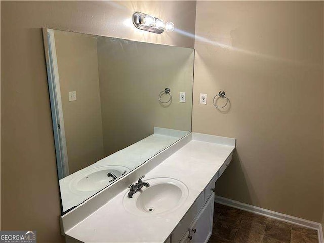 6536 Rebecca Lou Ln, Lithonia, GA 30058 - bathroom with vanity and baseboards