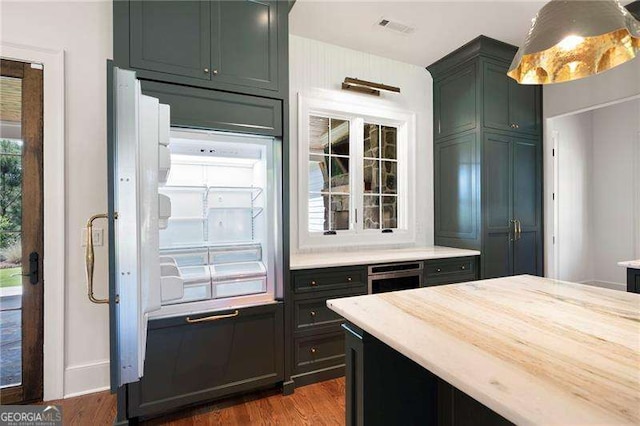 1830 Maple St, Carrollton, GA 30117 - kitchen with dark wood-style floors and stainless steel appliances