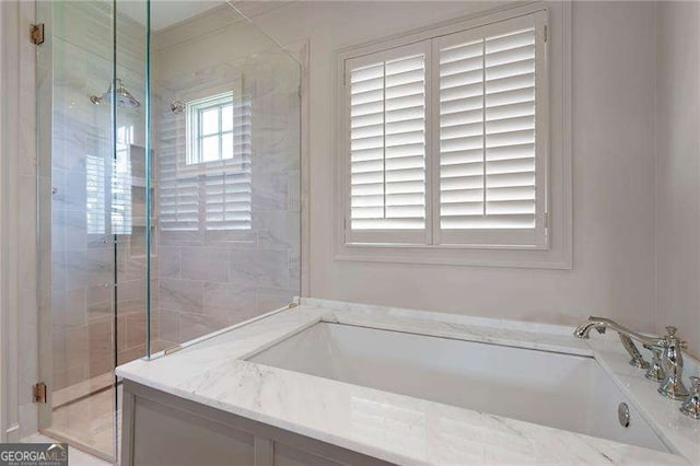 1830 Maple St, Carrollton, GA 30117 - bathroom with a shower stall and a bath
