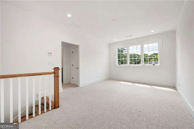 1830 Maple St, Carrollton, GA 30117 - spare room with light colored carpet, recessed lighting, and baseboards