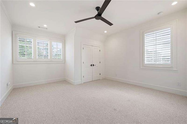 1830 Maple St, Carrollton, GA 30117 - unfurnished bedroom featuring recessed lighting, light colored carpet, baseboards, ceiling fan, and a closet