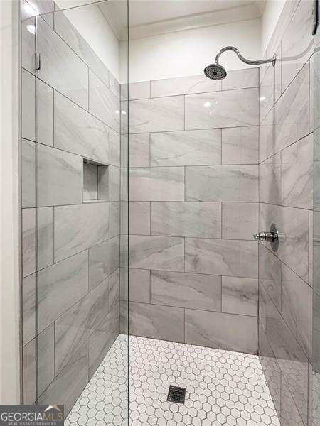 1830 Maple St, Carrollton, GA 30117 - full bathroom with tiled shower