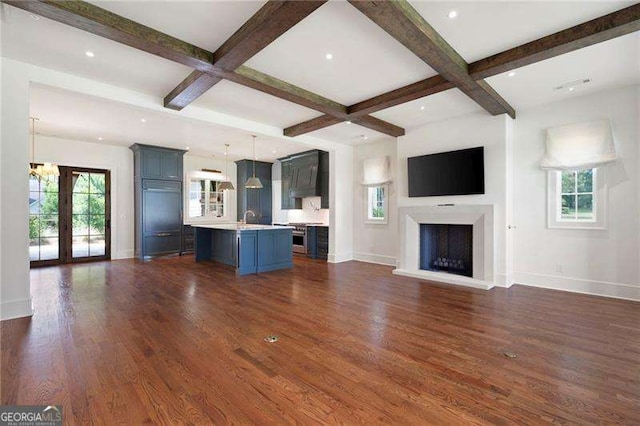 1830 Maple St, Carrollton, GA 30117 - unfurnished living room featuring baseboards, beamed ceiling, dark wood-style floors, coffered ceiling, and a fireplace
