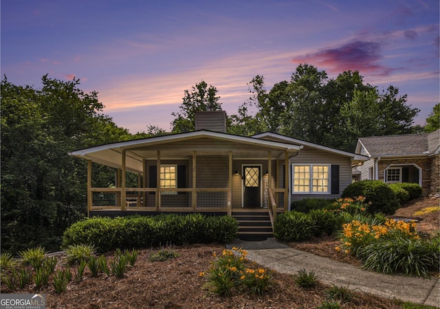 345 Davis Rd W, Fairmount, GA 30139 - view of front of home featuring a porch and a chimney