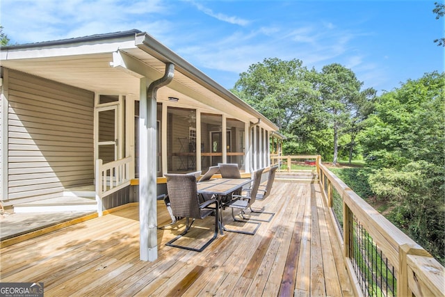 345 Davis Rd W, Fairmount, GA 30139 - wooden terrace with outdoor dining area and a sunroom