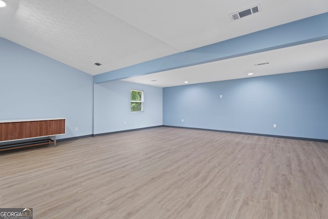 226 Old Atlanta Rd, Stockbridge, GA 30281 - unfurnished living room featuring wood finished floors, baseboards, and recessed lighting