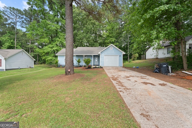 226 Old Atlanta Rd, Stockbridge, GA 30281 - view of front of property with a garage, driveway, a front yard, and view of wooded area