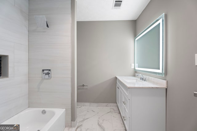 226 Old Atlanta Rd, Stockbridge, GA 30281 - full bath featuring marble finish flooring, vanity, and washtub / shower combination