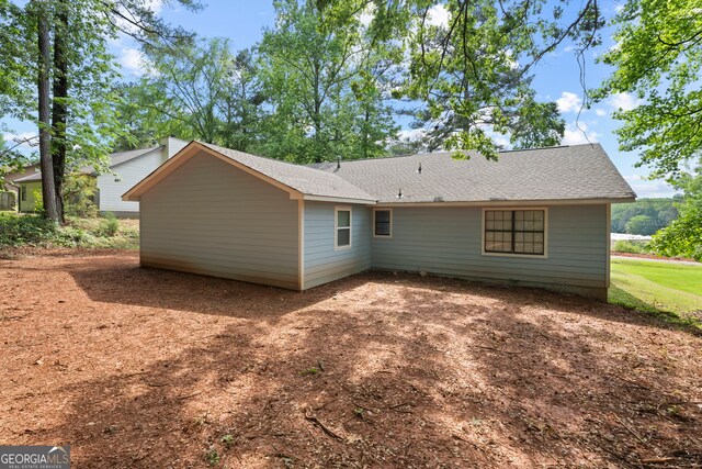 226 Old Atlanta Rd, Stockbridge, GA 30281 - rear view of property featuring roof with shingles
