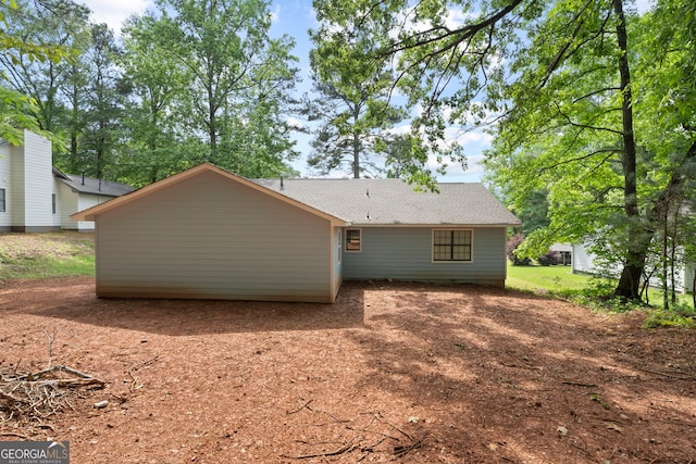 226 Old Atlanta Rd, Stockbridge, GA 30281 - rear view of property featuring roof with shingles