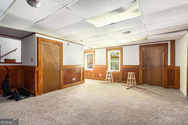 1956 Spencer Oaks Ln, Lithonia, GA 30058 - miscellaneous room featuring wainscoting, a drop ceiling, carpet, and wood walls