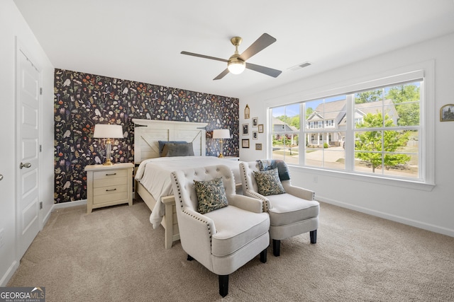 4044 Andover Cir, Mcdonough, GA 30252 - bedroom with wallpapered walls, baseboards, light carpet, and ceiling fan