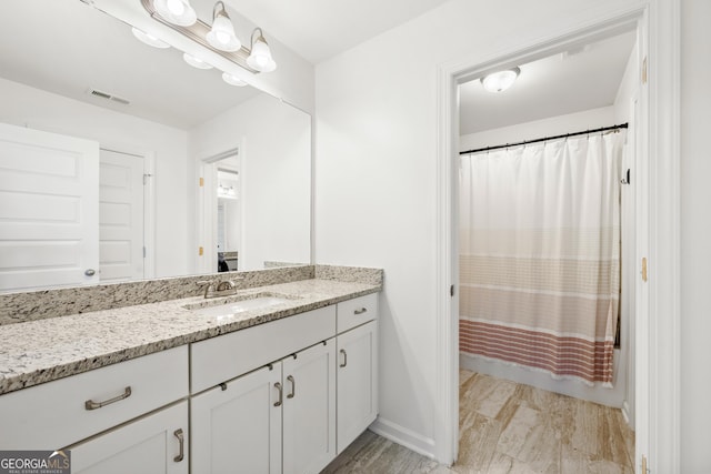 4044 Andover Cir, Mcdonough, GA 30252 - bathroom with vanity and baseboards