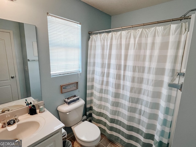 105 Sheffield Dr, Carrollton, GA 30117 - bathroom with vanity, toilet, and a shower with curtain