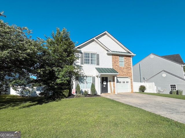 105 Sheffield Dr, Carrollton, GA 30117 - traditional-style home featuring concrete driveway, an attached garage, and stone siding