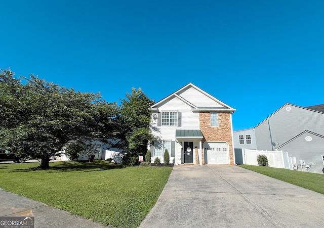 105 Sheffield Dr, Carrollton, GA 30117 - traditional home featuring an attached garage and driveway