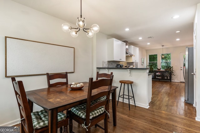 429 Deckner Ave SW, Atlanta, GA 30310 - dining space featuring dark wood-style flooring, recessed lighting, a chandelier, and baseboards