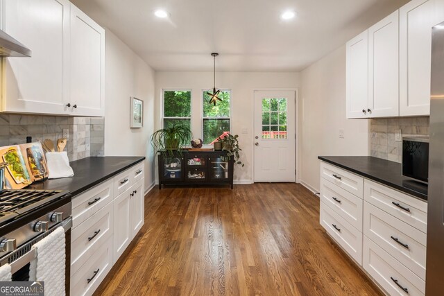 429 Deckner Ave SW, Atlanta, GA 30310 - kitchen with dark countertops, dark wood-style flooring, white cabinetry, and recessed lighting