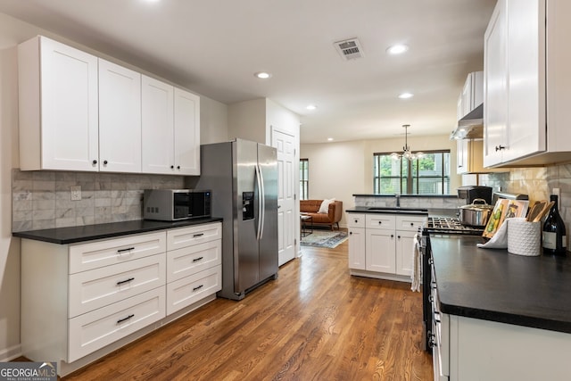 429 Deckner Ave SW, Atlanta, GA 30310 - kitchen featuring dark countertops, white cabinets, recessed lighting, and dark wood-type flooring