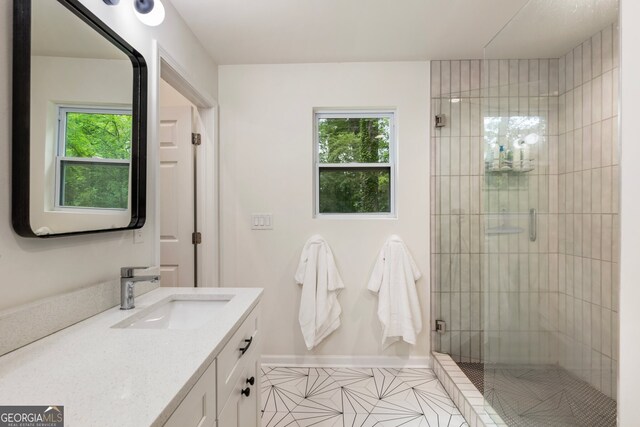 429 Deckner Ave SW, Atlanta, GA 30310 - full bathroom with plenty of natural light, vanity, a stall shower, and tile patterned floors