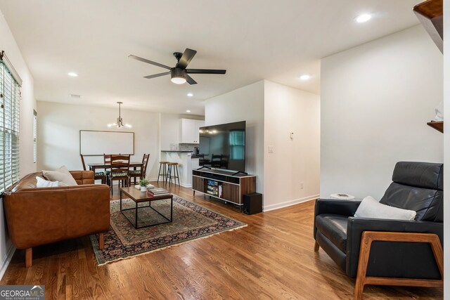 429 Deckner Ave SW, Atlanta, GA 30310 - living area featuring a ceiling fan, wood finished floors, baseboards, recessed lighting, and a chandelier