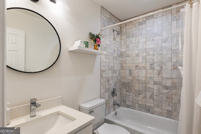 429 Deckner Ave SW, Atlanta, GA 30310 - bathroom featuring shower / tub combo with curtain, toilet, and vanity
