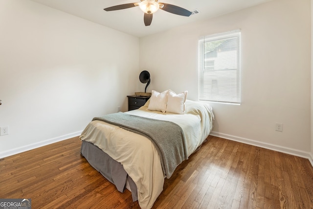 429 Deckner Ave SW, Atlanta, GA 30310 - bedroom featuring baseboards, hardwood / wood-style flooring, and a ceiling fan