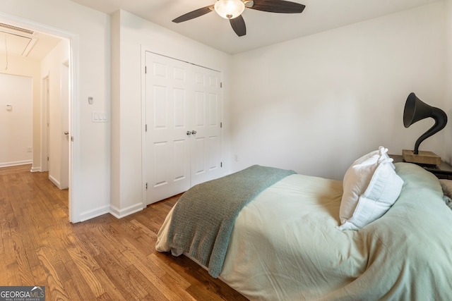 429 Deckner Ave SW, Atlanta, GA 30310 - bedroom with attic access, wood finished floors, baseboards, a ceiling fan, and a closet