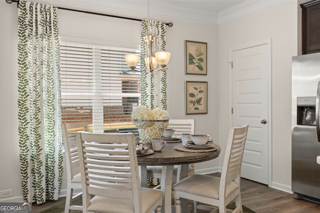 237 Orion Dr, Dalton, GA 30720 - dining area with dark wood-type flooring, crown molding, a chandelier, and baseboards
