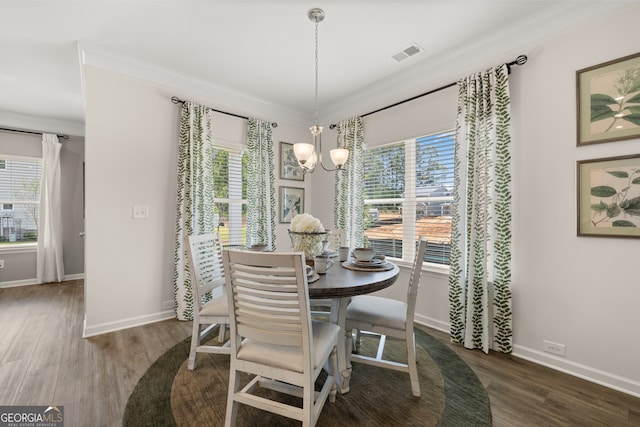 237 Orion Dr, Dalton, GA 30720 - dining space featuring a chandelier, crown molding, healthy amount of natural light, and wood finished floors