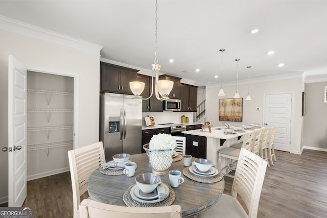 237 Orion Dr, Dalton, GA 30720 - dining space featuring recessed lighting, ornamental molding, wood finished floors, and baseboards