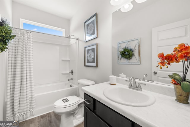 237 Orion Dr, Dalton, GA 30720 - bathroom with vanity, shower / bathtub combination with curtain, wood finished floors, and toilet