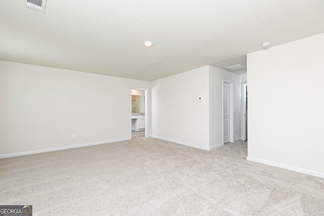 303 Limestone Cir, Conyers, GA 30013 - unfurnished room featuring light carpet, baseboards, and a smoke detector