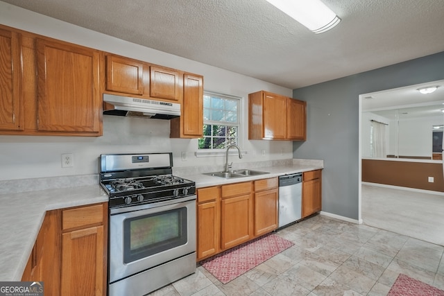 3524 Forest Downs Cv, Decatur, GA 30034 - kitchen with appliances with stainless steel finishes, under cabinet range hood, a sink, light countertops, and a textured ceiling